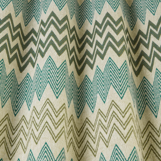 Cream fabric with layered jade, teal and olive zigzag chevrons