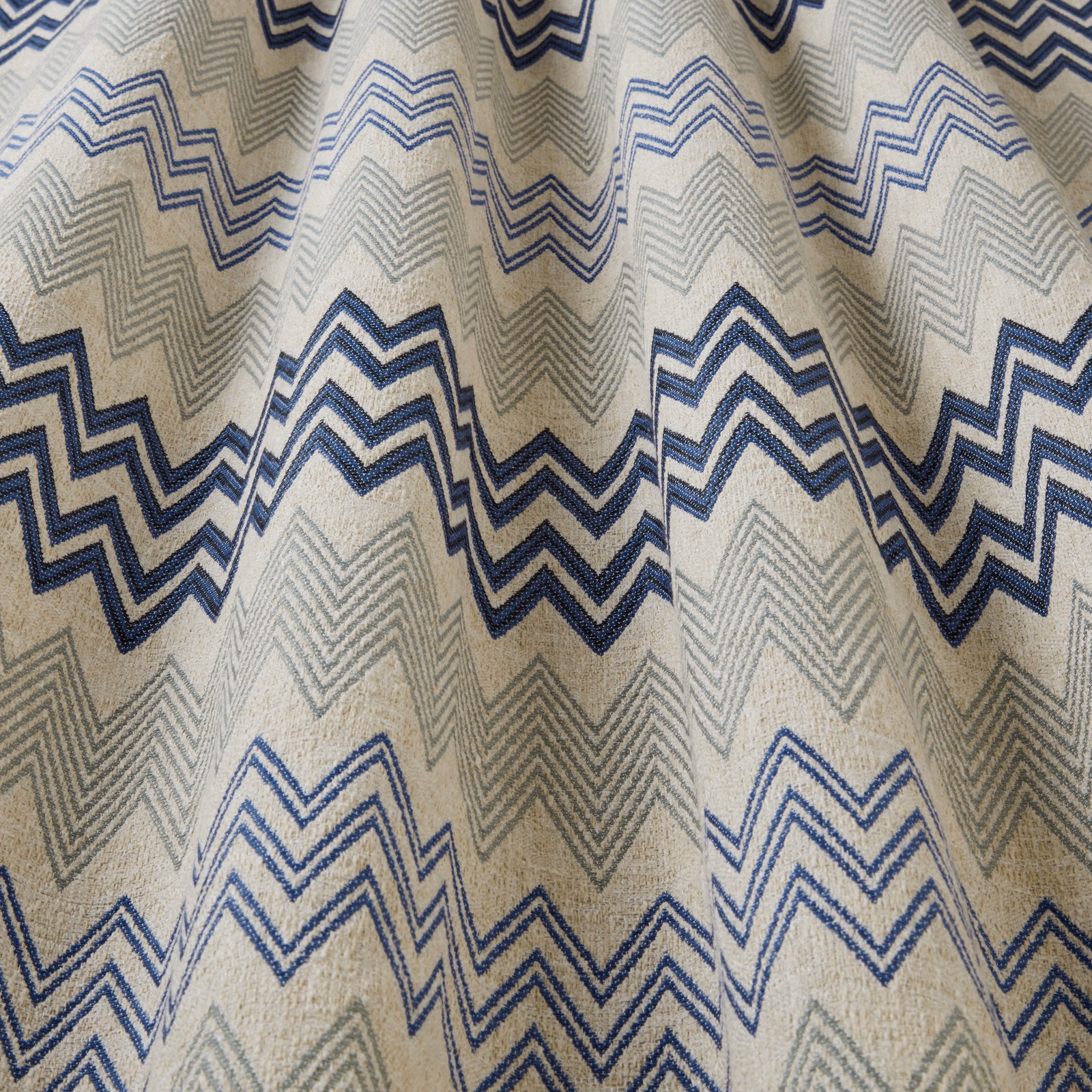 Oatmeal woven fabric with navy and pale blue zigzag stripes