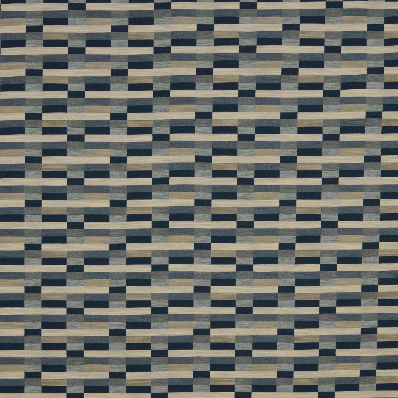 Close-up of a navy, grey and sand geometric woven fabric swatch