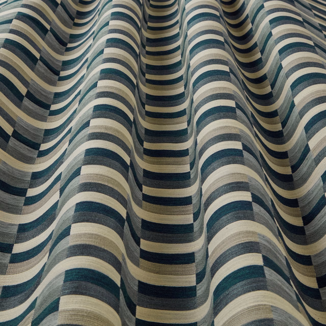 Teal, cream and slate wavy striped woven fabric with a textured finish