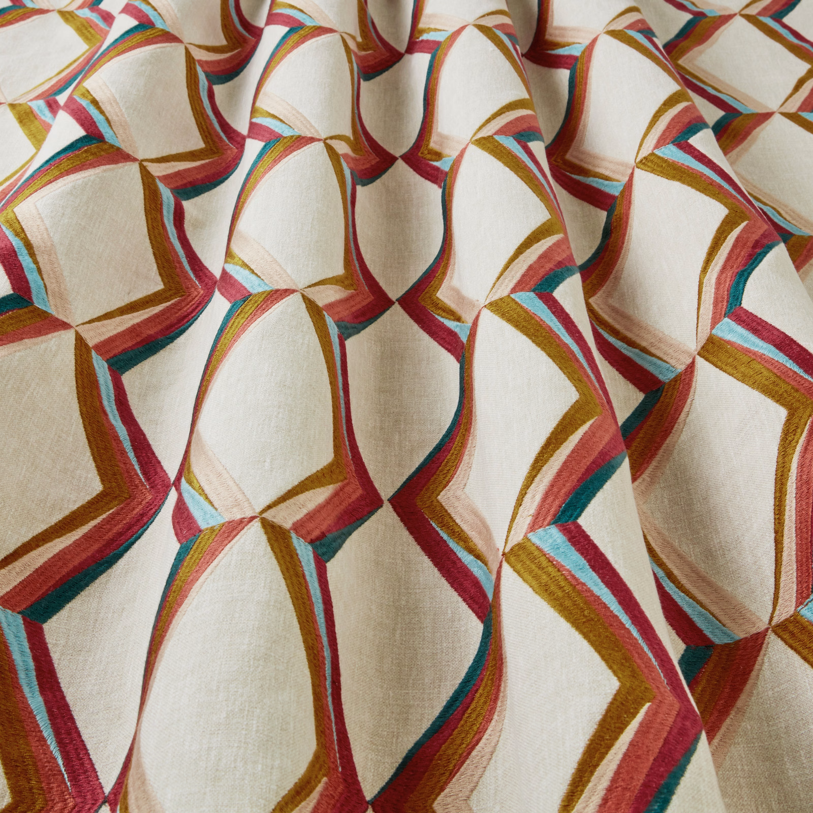 Cream fabric with large wavy geometric arches in bilberry, teal, magenta and gold