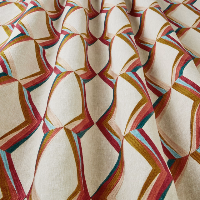 Cream fabric with large wavy geometric arches in bilberry, teal, magenta and gold