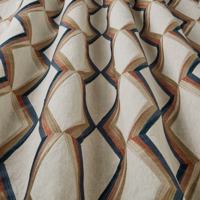 Ivory geometric fabric with wavy navy, rust and taupe bands