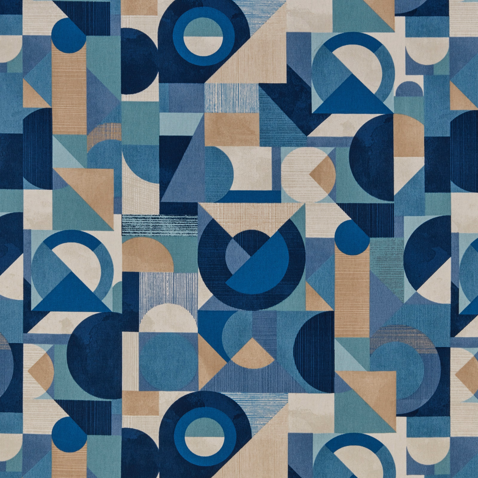 Large-scale blue geometric fabric with circles, blocks and textured bands