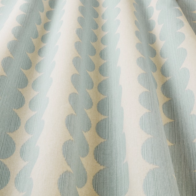 Seafoam blue and ivory geometric wavy pattern on textured woven fabric