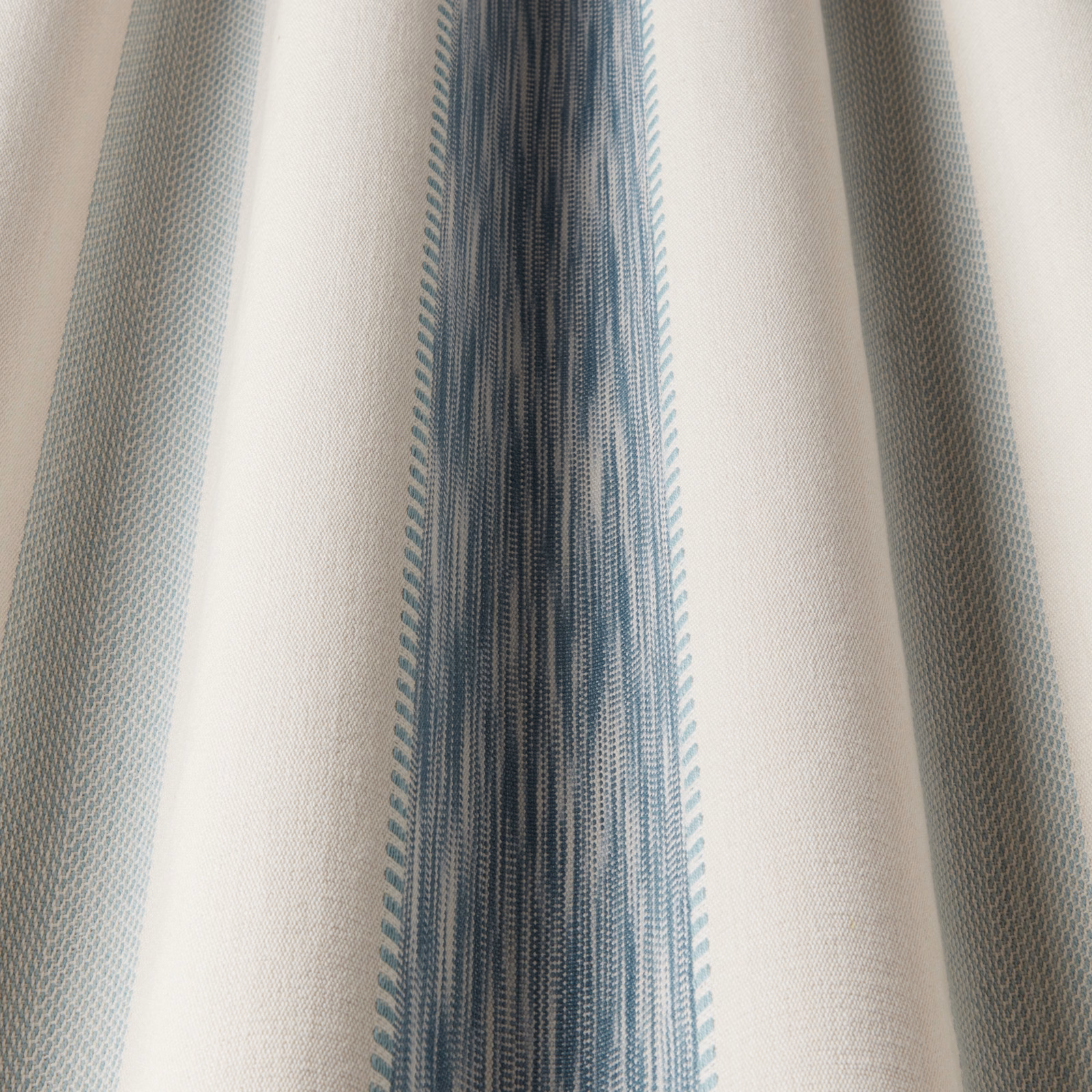 Vertical aqua and blue striped cotton fabric with fine woven texture