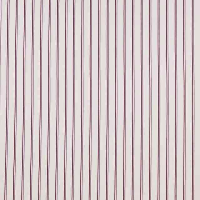 Vertical dusty grape pinstripes on a pale cotton ground