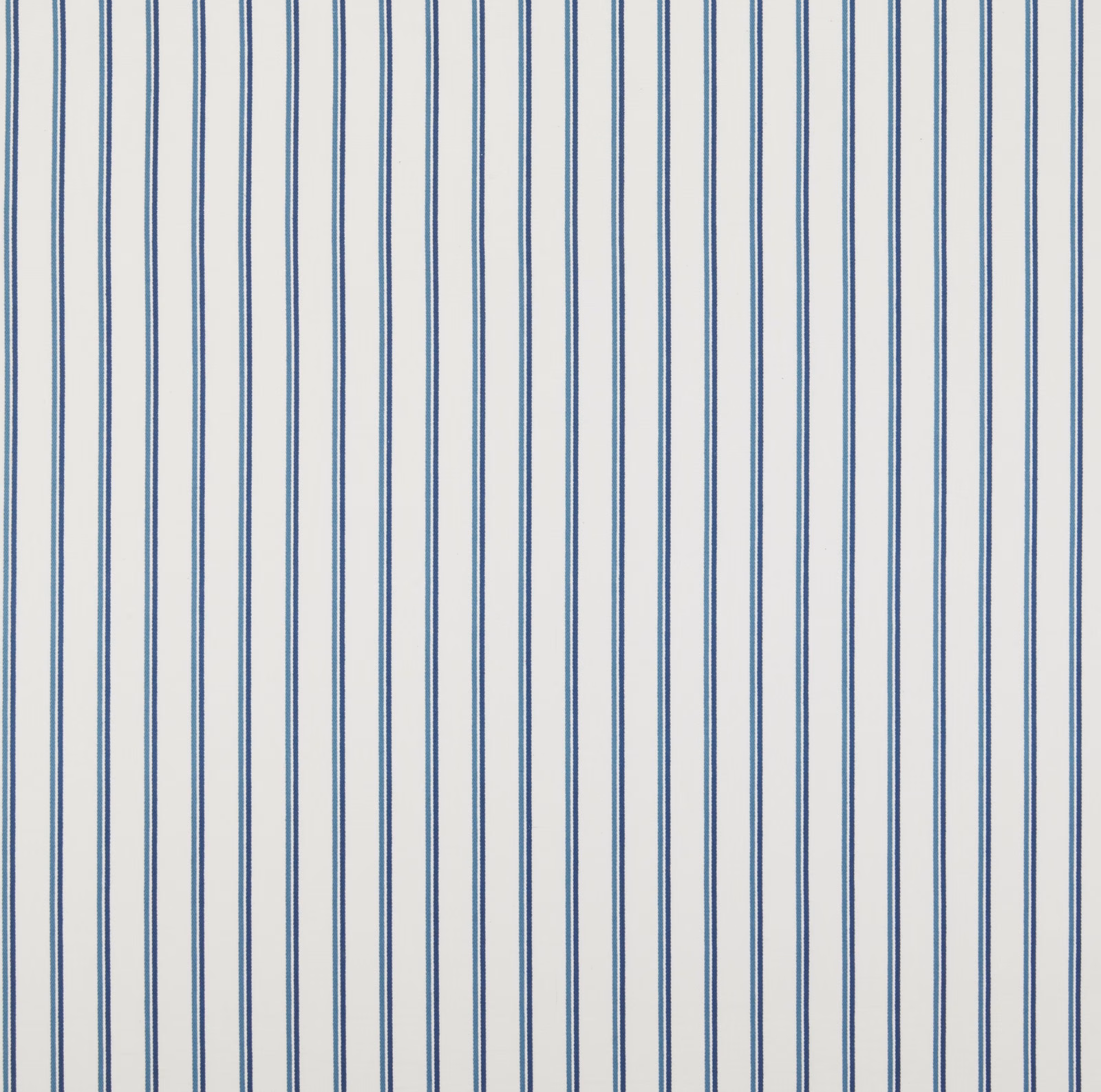 Blue vertical stripe cotton fabric on a pale ground, flat woven texture