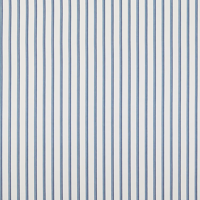 Blue vertical stripe cotton fabric on a pale ground, flat woven texture