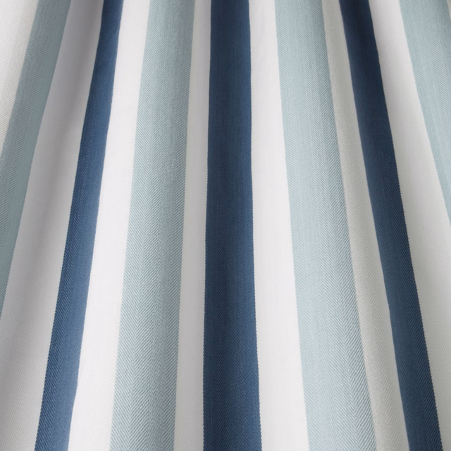 Vertical aqua, navy and white striped cotton fabric with subtle herringbone weave