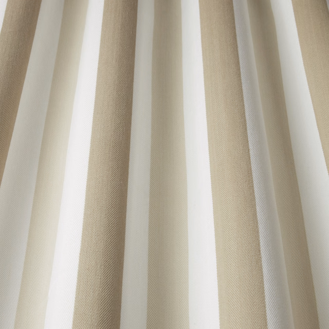 Cream cotton fabric with vertical wavy stripes and fine herringbone texture