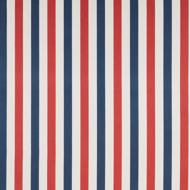 Vertical red and navy stripes on an ivory cotton fabric swatch