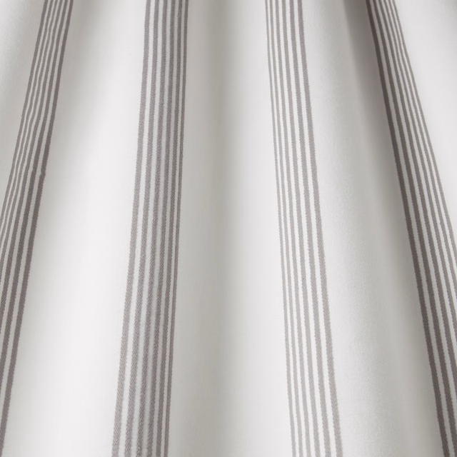 Vertical flint-grey stripe fabric on a pale off-white cotton ground
