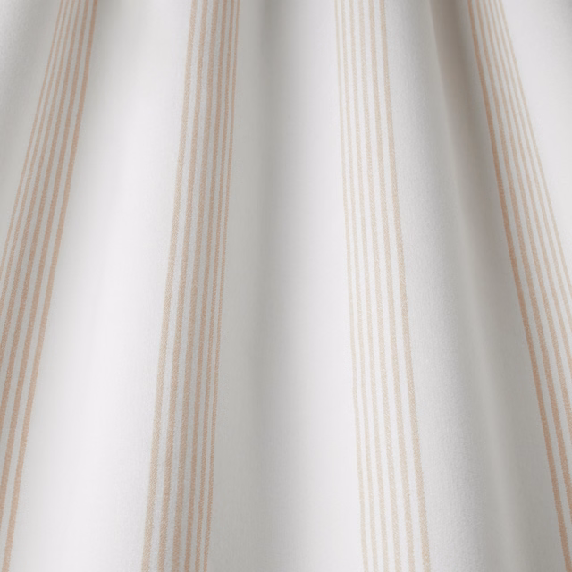 Cream cotton fabric with narrow wavy blush-rose vertical stripes