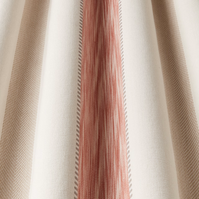 Vertical raspberry and beige striped cotton fabric with a pale ground