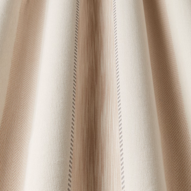 Soft rose beige striped cotton fabric with a woven texture and subtle vertical sheen