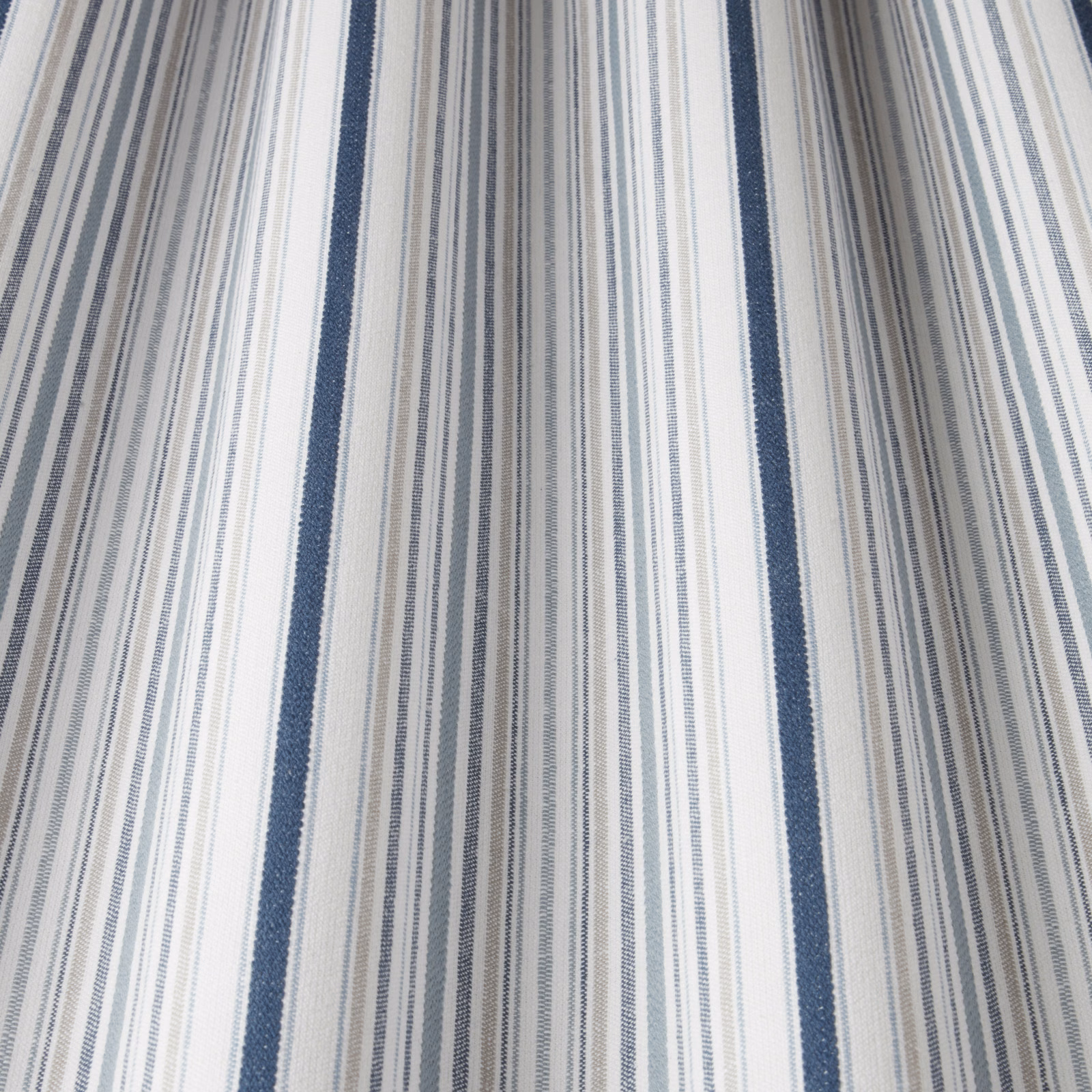 Blue and white striped cotton fabric with narrow pinstripes and navy bands