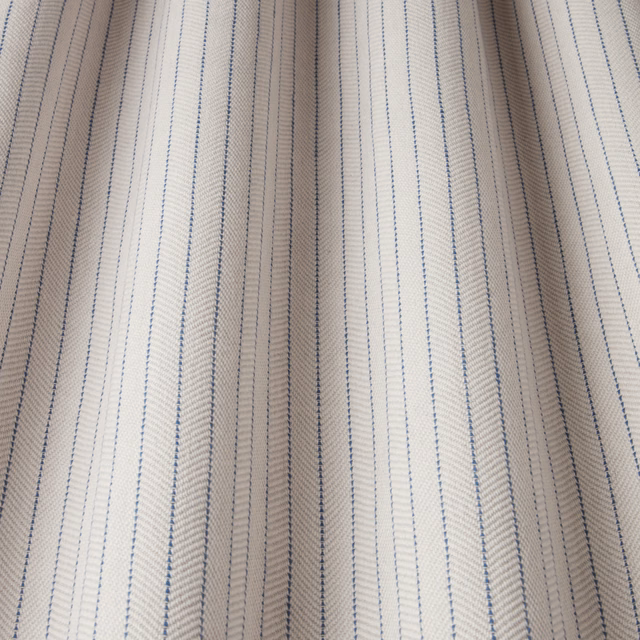 Cream cotton fabric with fine kingfisher blue pinstripes