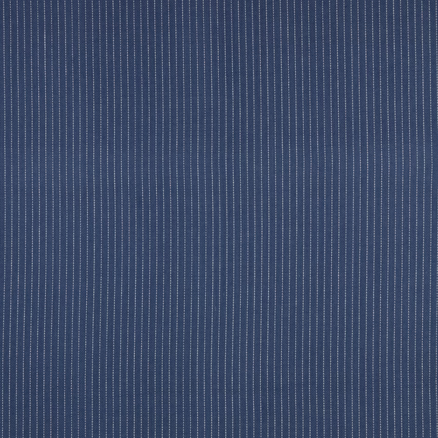 Muted denim-blue cotton fabric with fine vertical pale pinstripes