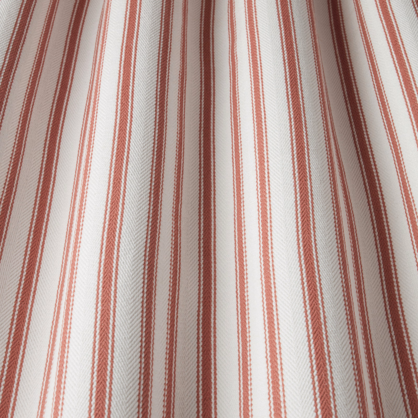 Cream cotton fabric with narrow raspberry vertical stripes and subtle herringbone weave