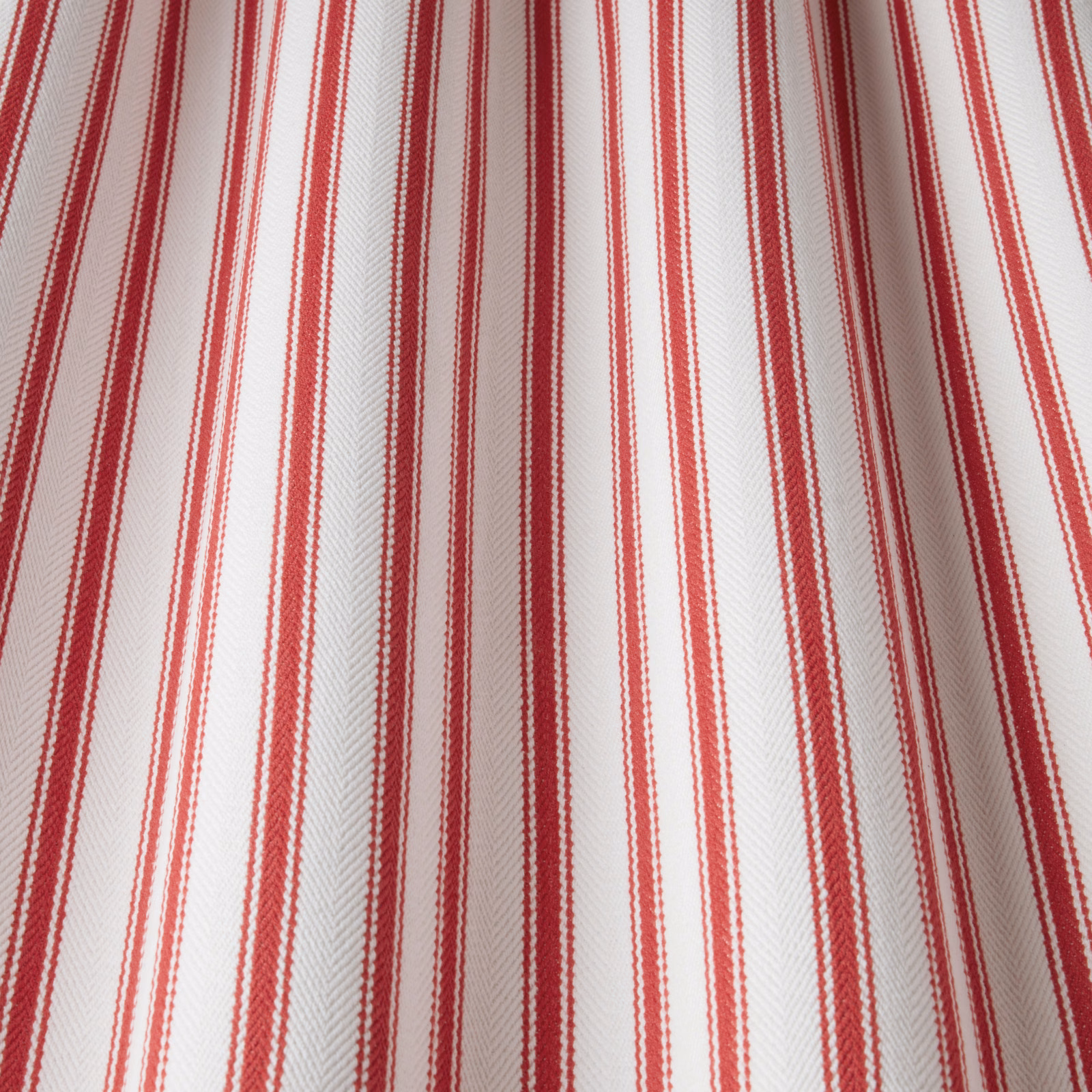 Red vertical stripe cotton fabric with subtle herringbone weave on ivory ground