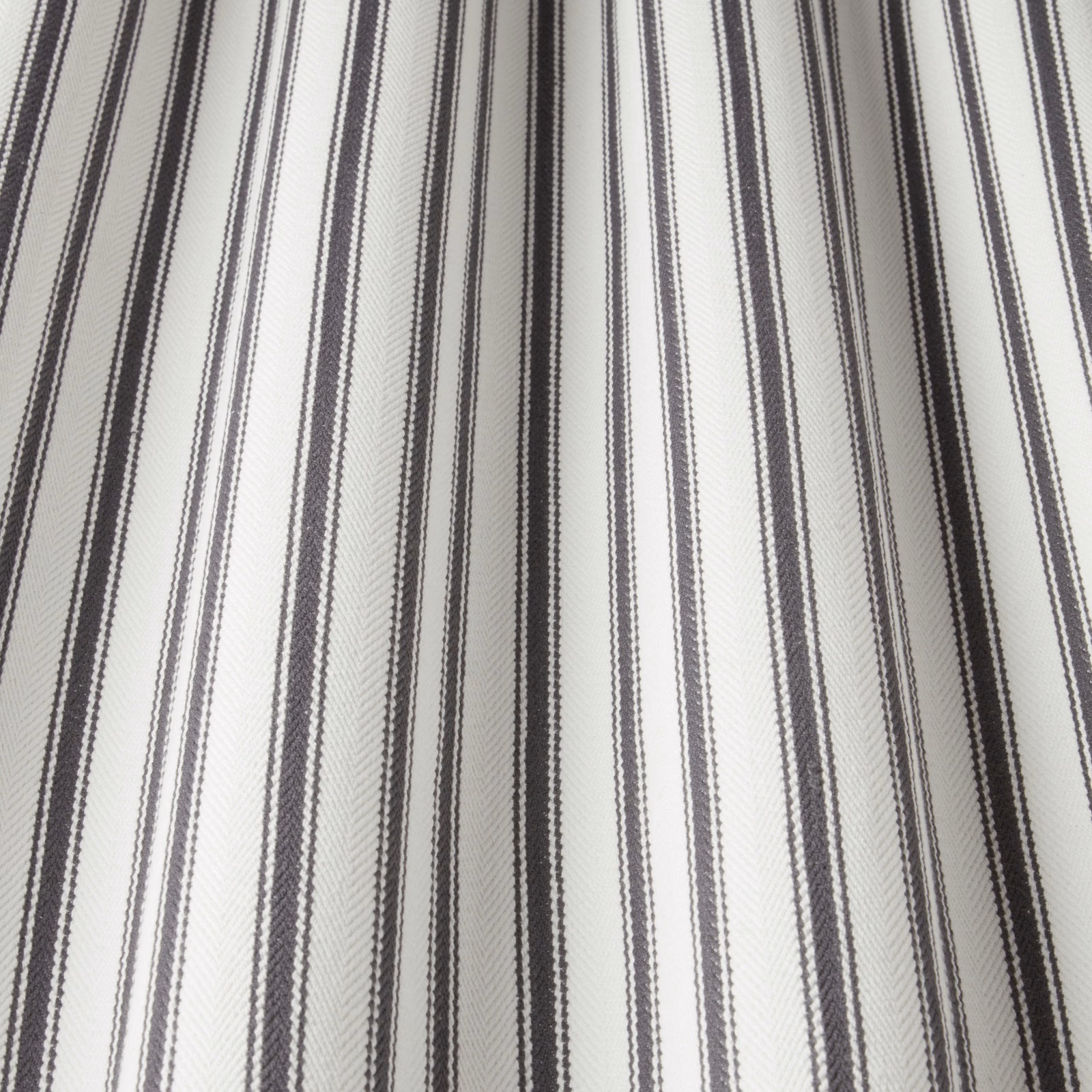 Off-white cotton fabric with narrow and broad wavy slate-grey stripes