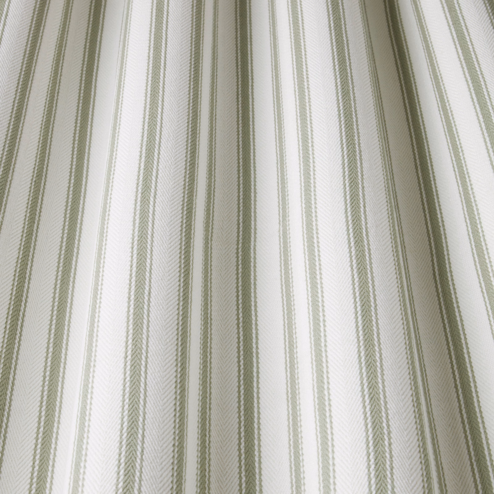 Pale cotton fabric with fine willow-green wavy vertical stripes