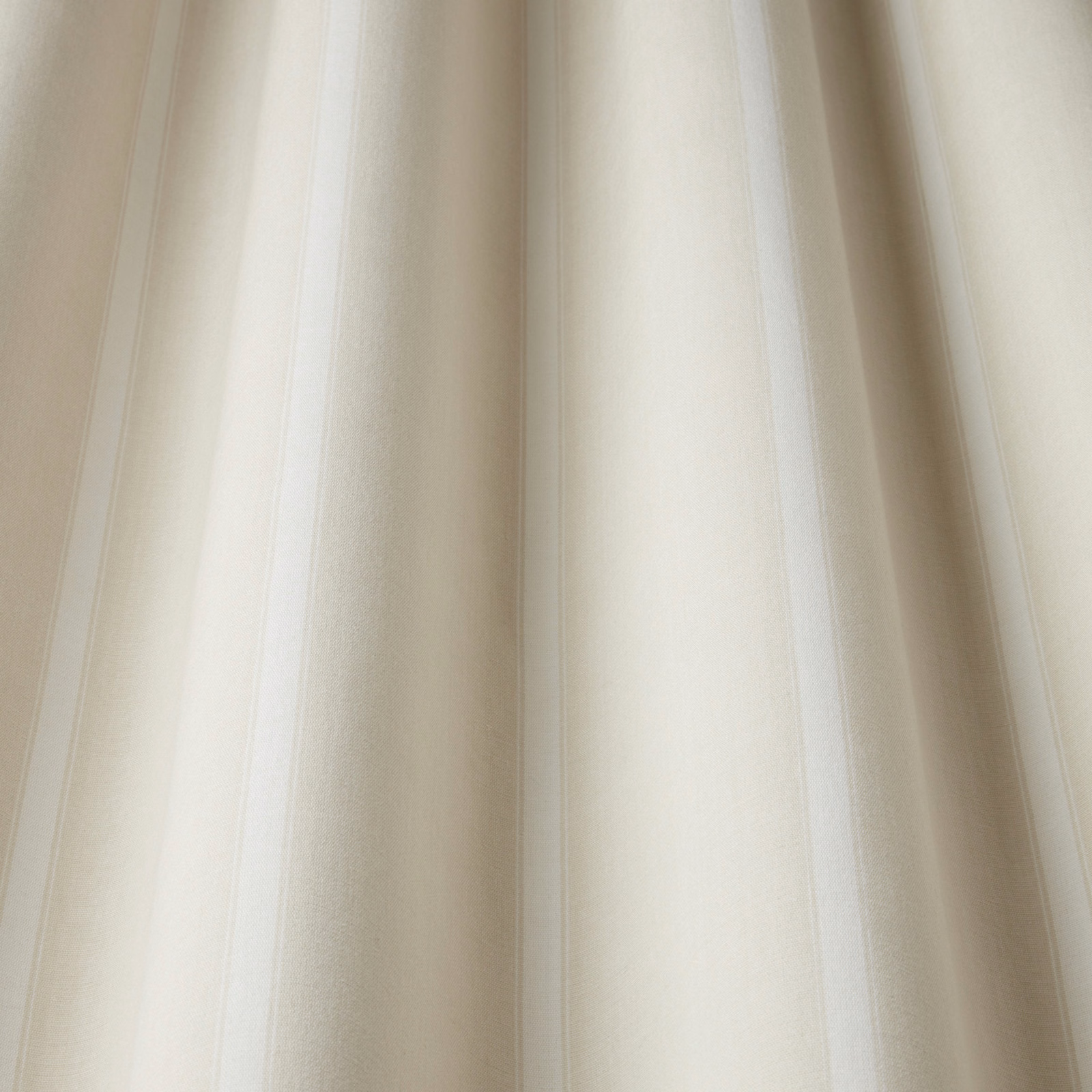 Cream striped cotton fabric with soft wavy vertical folds and a linen-like texture