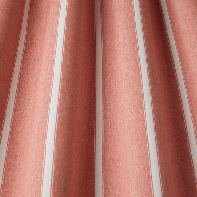 Raspberry pink and ivory wavy stripe cotton fabric with soft woven texture