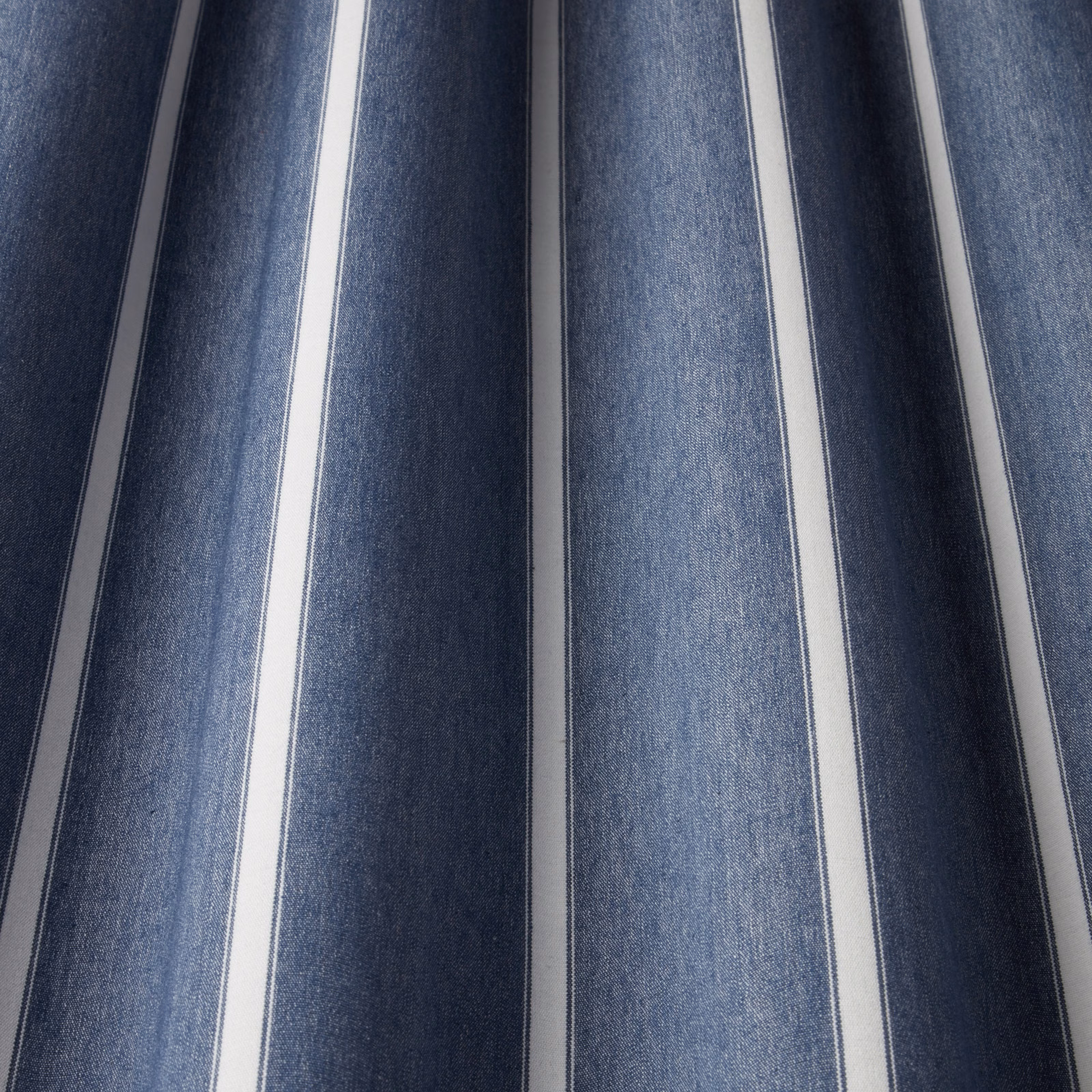 Blue and white wide striped cotton fabric with a softly woven texture