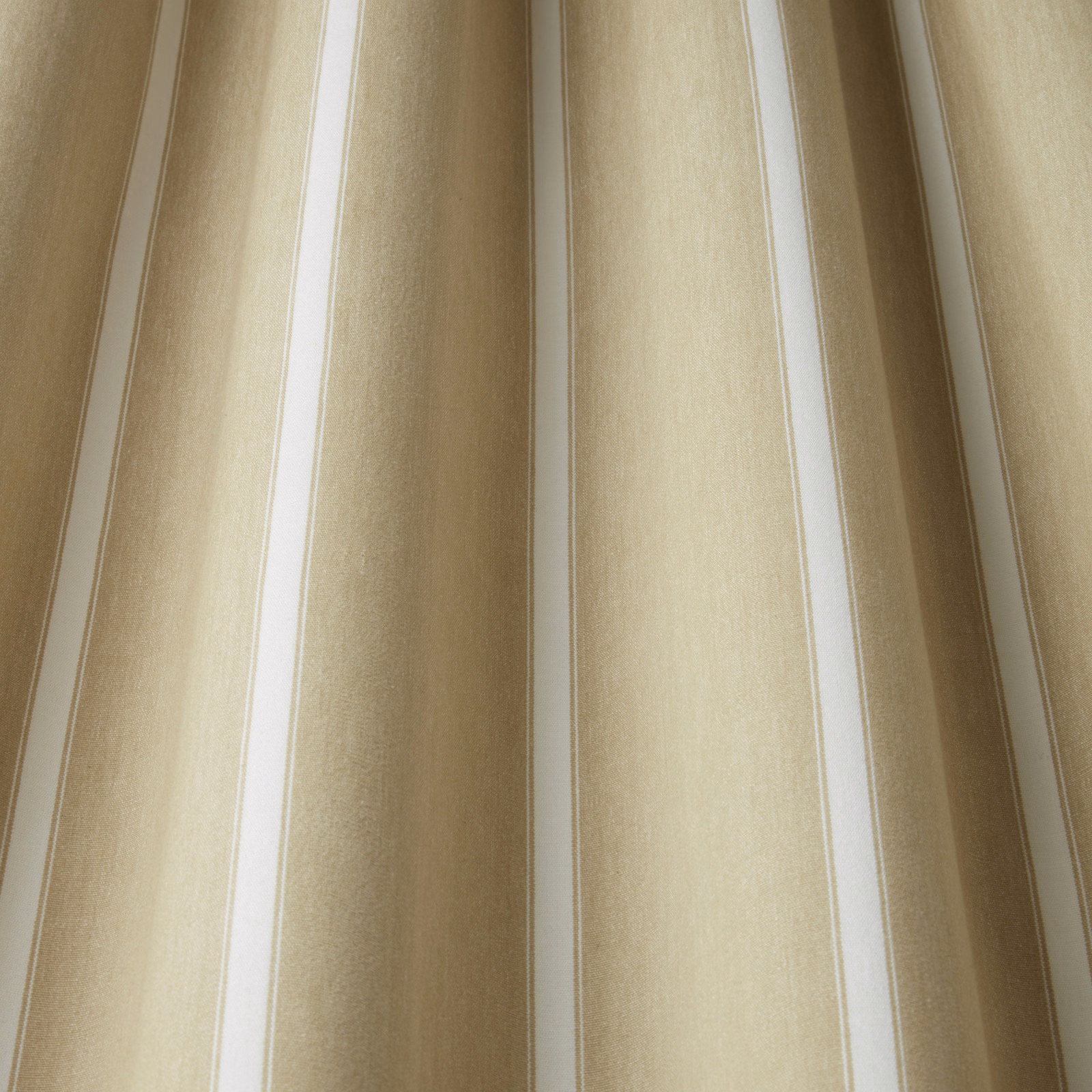 Close-up of warm stone beige vertical stripes on softly woven cotton fabric