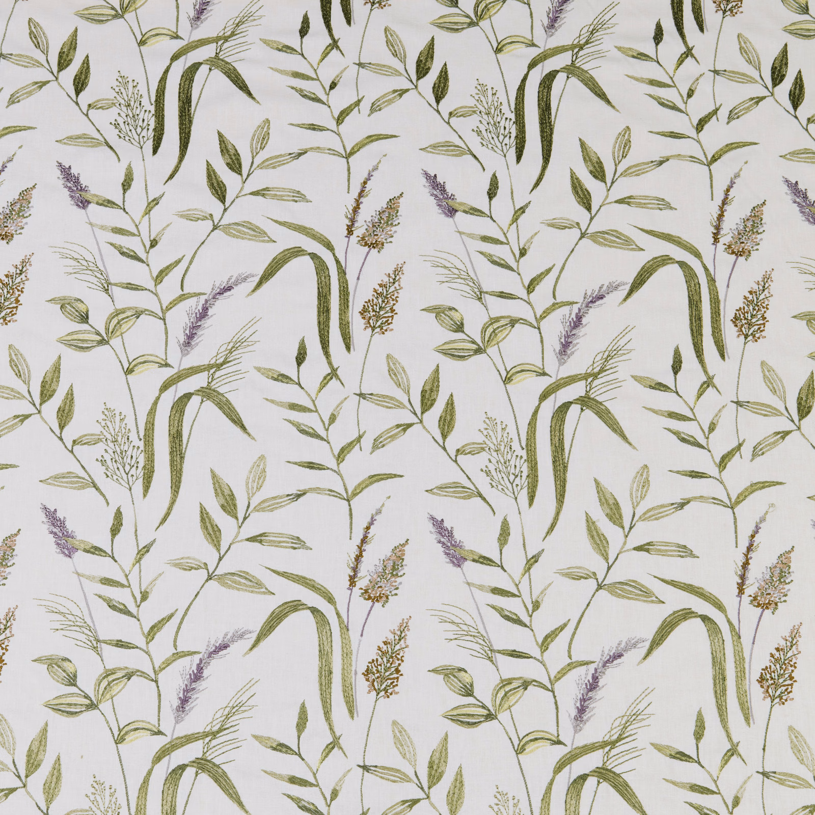 Botanical cotton fabric with eucalyptus green leaves and lilac sprigs on a pale ground