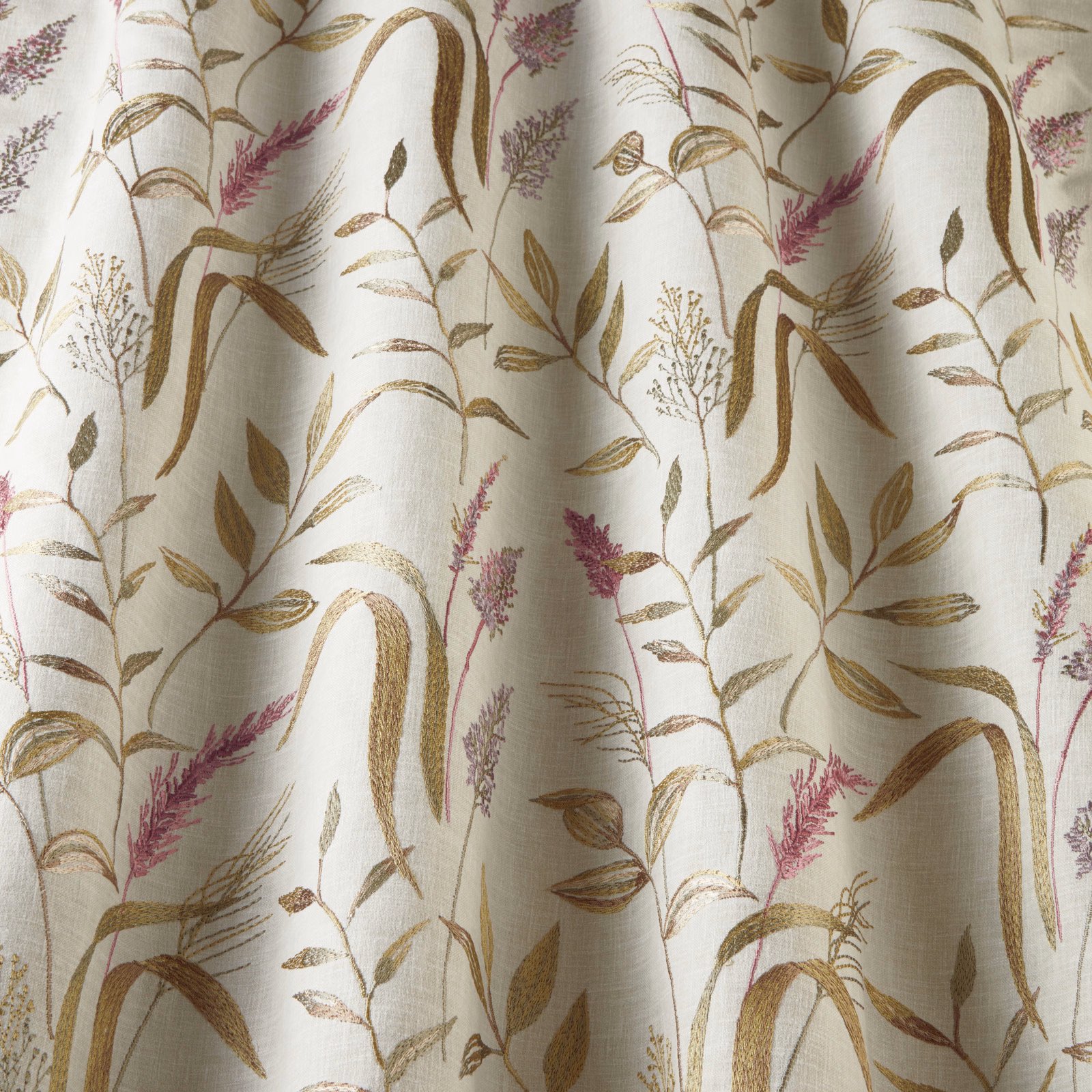 Cream cotton fabric with wavy botanical stems in rosewood, olive and tan