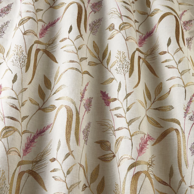 Cream cotton fabric with wavy botanical stems in rosewood, olive and tan