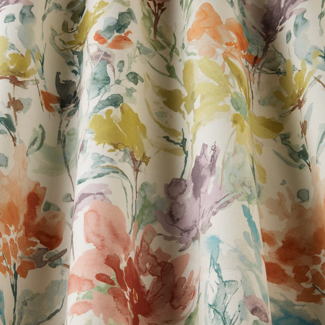 Painterly floral cotton in cream with clementine, lemon, lilac and aqua blossoms