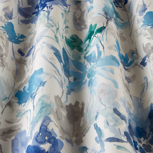 Painterly cobalt, aqua and grey brushstroke fabric on a pale ground