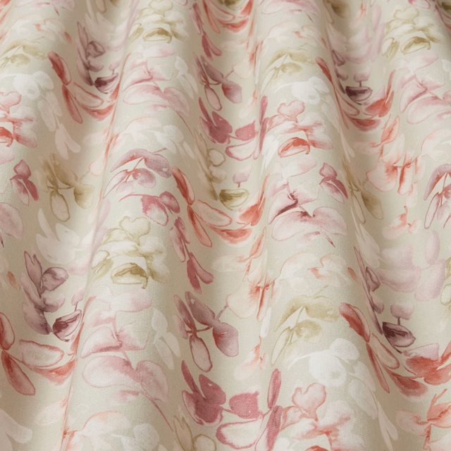 Cream cotton fabric with flowing rosewood and blush floral waves
