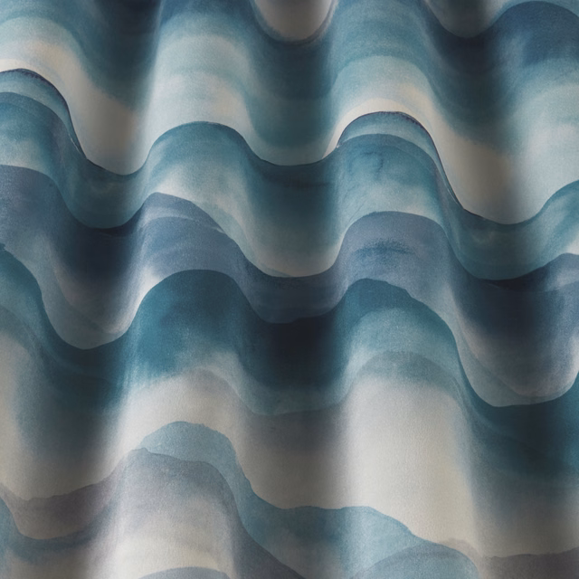 Layered cobalt, aqua and pale cream wavy fabric with soft painterly bands