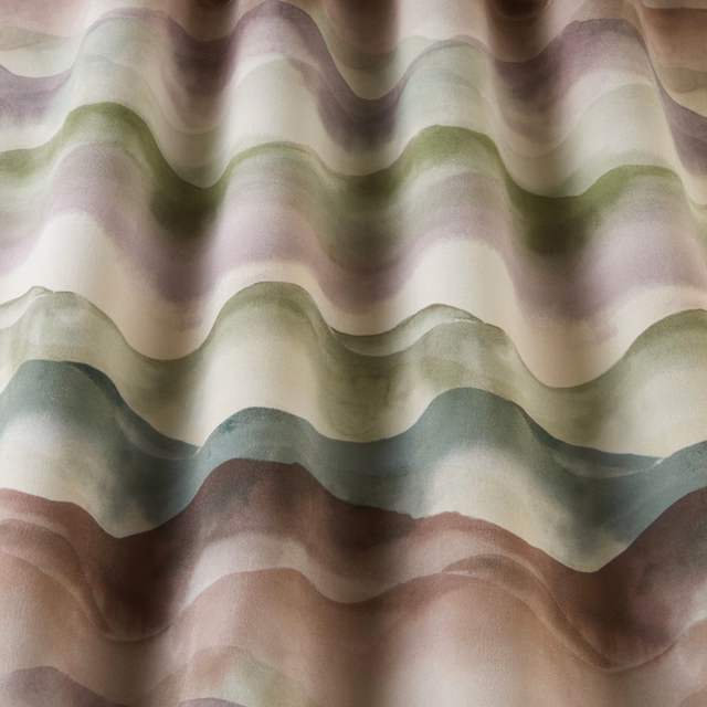Folded cotton fabric with wavy eucalyptus green, lilac and cream bands