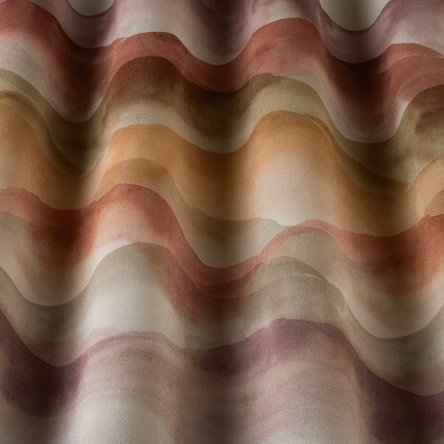 Layered rosewood and blush wavy stripes on a soft cotton fabric