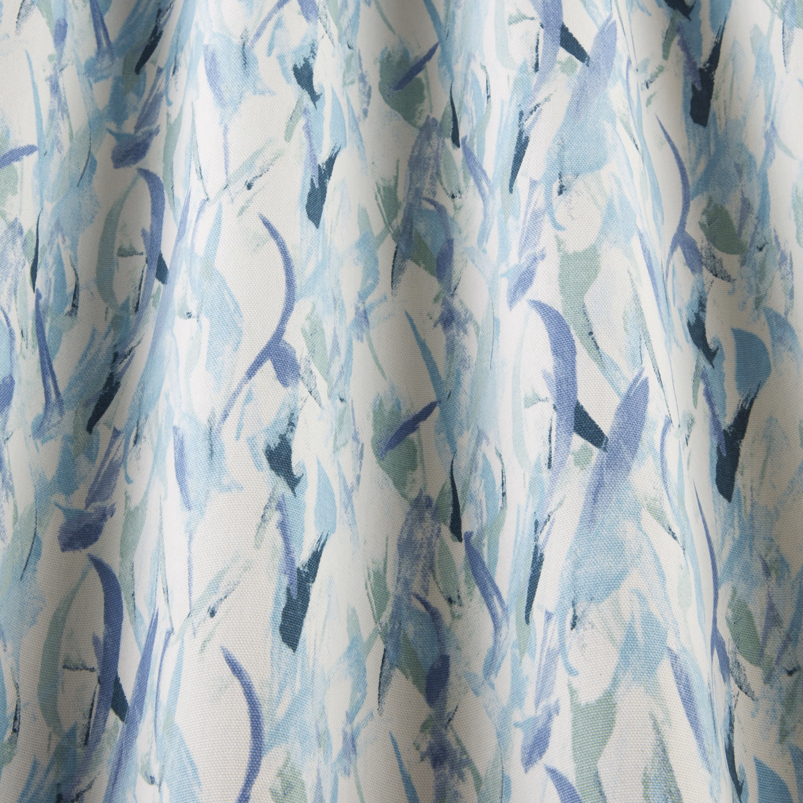 Abstract cotton fabric with cobalt, aqua and soft green brushstrokes on ivory