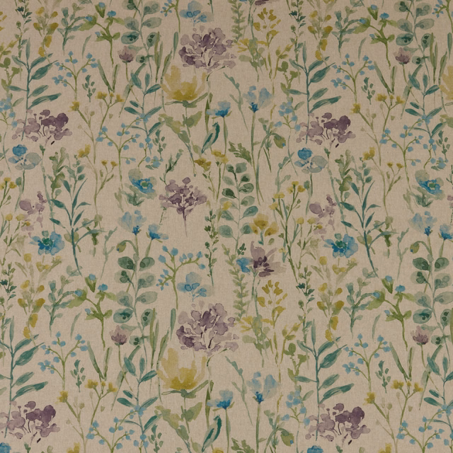 Painterly wildflower fabric in jade, blue, mauve and soft green on a pale ground