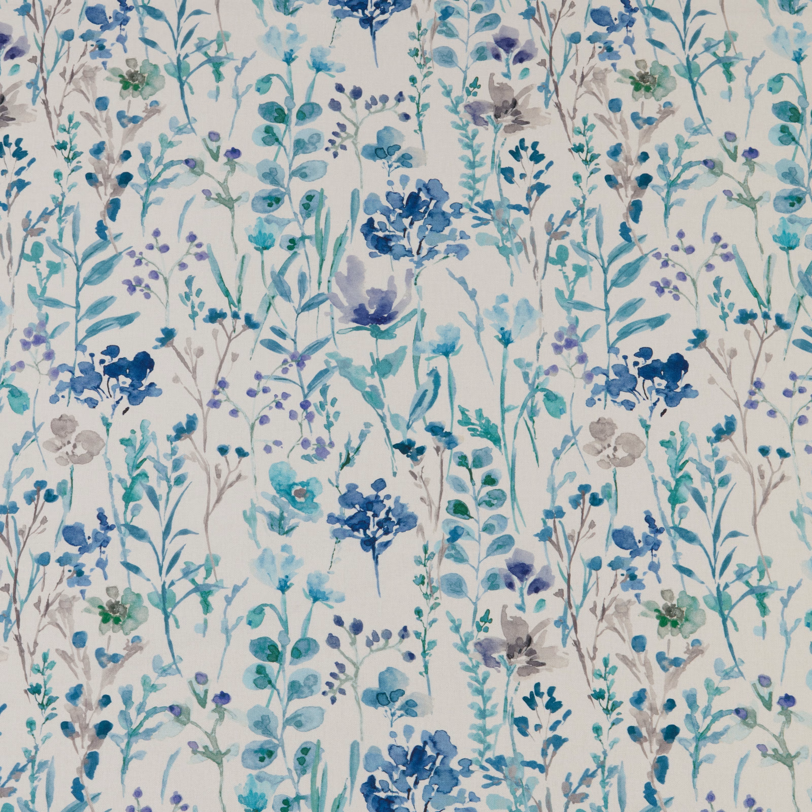 Watercolour meadow floral fabric with cobalt blue, aqua and lilac stems on a pale ground