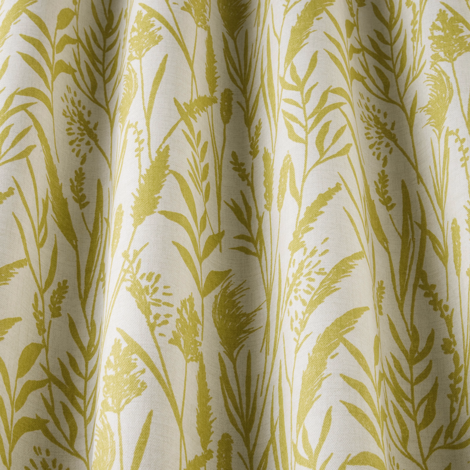 Citrus yellow wild grass botanical print on pale cotton fabric with soft drape