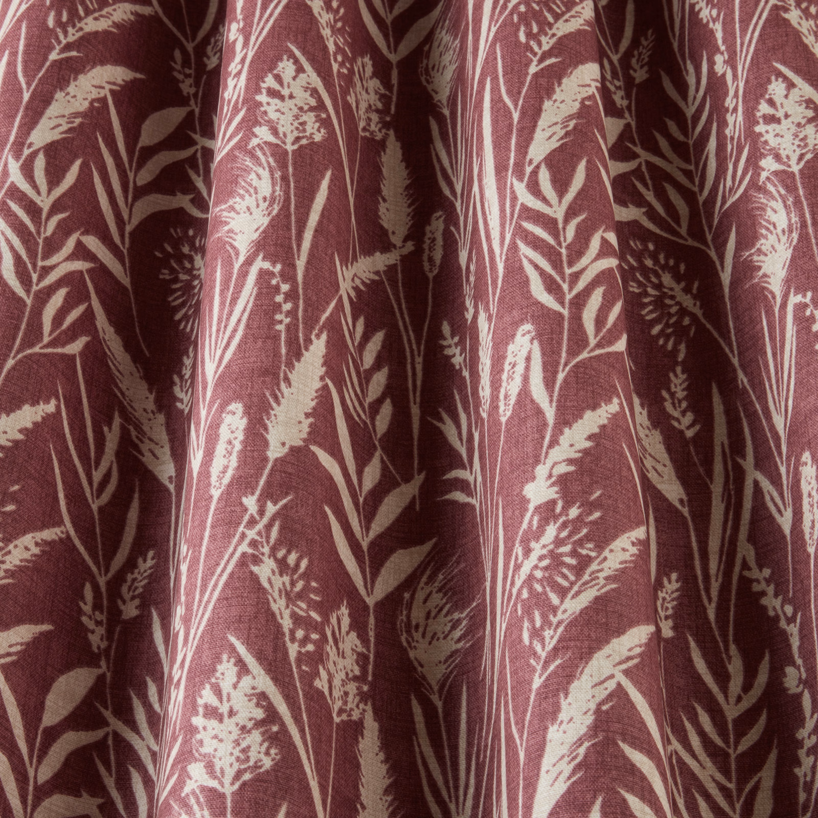 Rosewood cotton fabric with cream wild grass print and soft woven texture