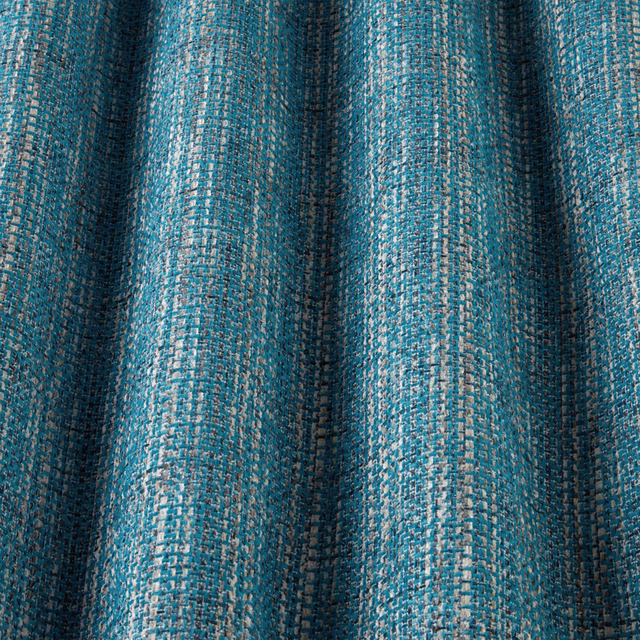 Blue textured woven fabric with vertical rippled folds and flecked cobalt stripes