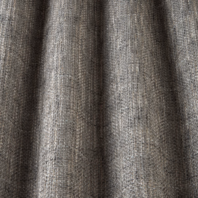 Close-up of cool taupe woven fabric with subtle wavy texture and soft sheen