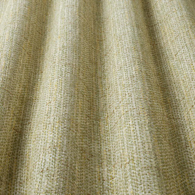 Soft moss green woven stripe fabric with rippled texture and pale highlights