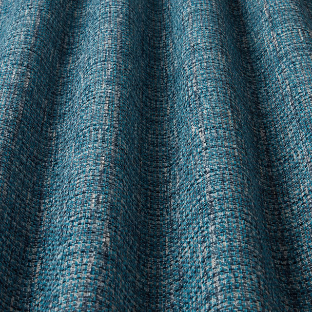 Teal and midnight blue woven fabric with wavy texture and small flecked pattern