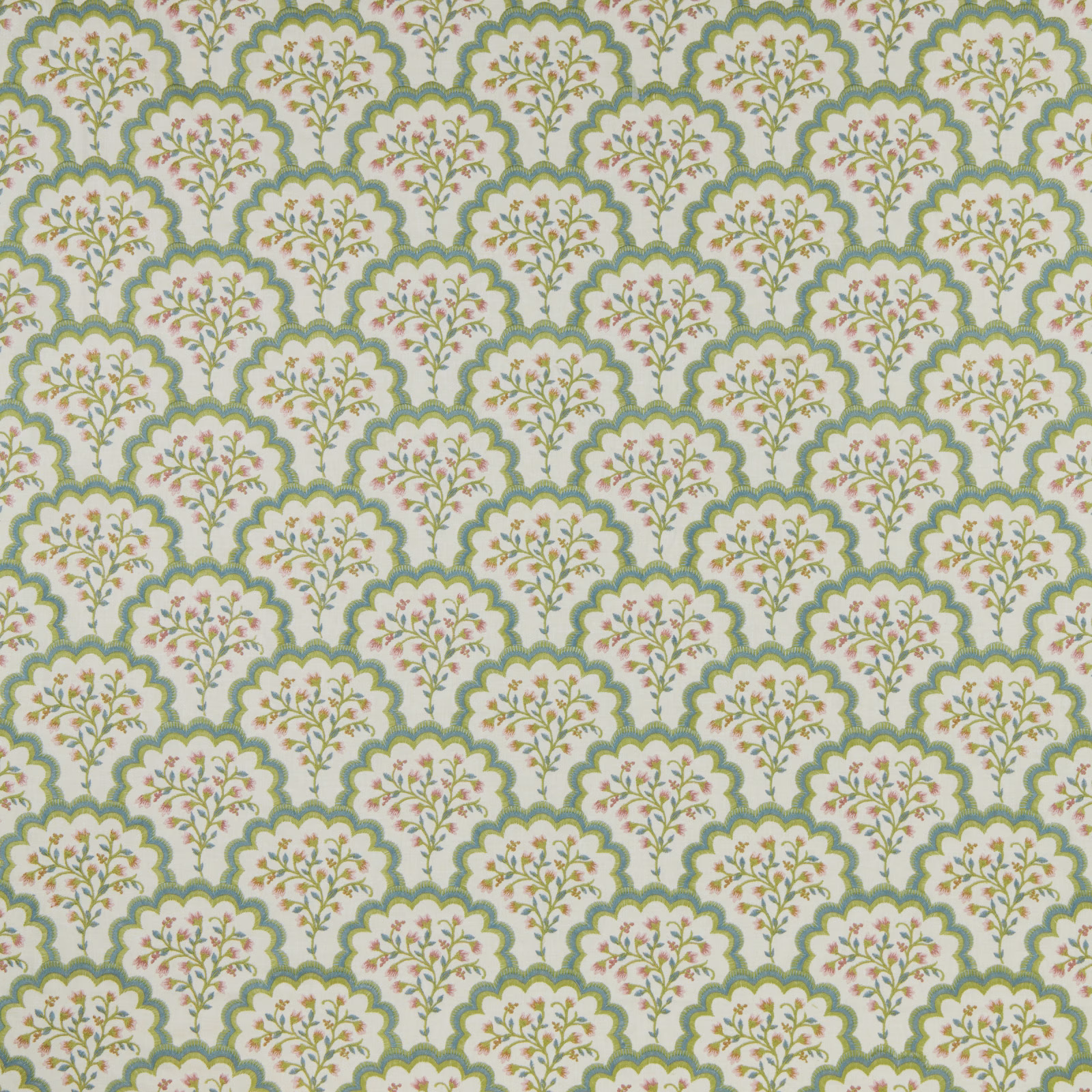 Scalloped floral fabric in soft green, cream and pink embroidered detail